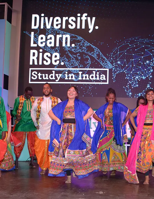 Students from different countries dancing at Study in India launch event